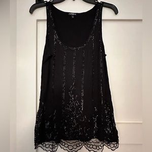 Woman’s black sequined tank top